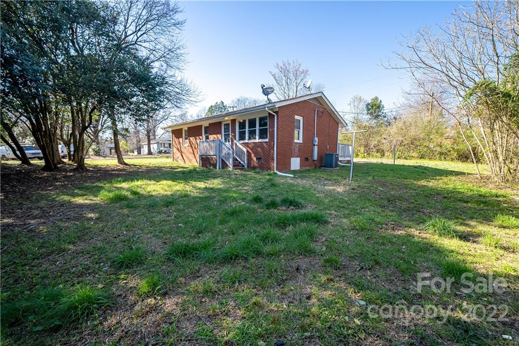 250 Rock Church Road Oakboro, NC 28129 - Photo 7 of 21 a front view of house with yard and green space