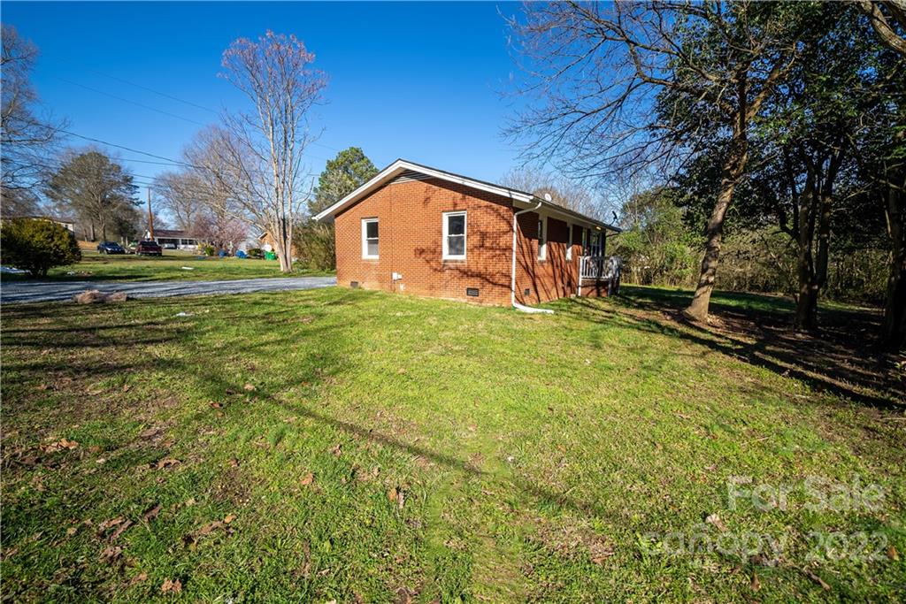 250 Rock Church Road Oakboro, NC 28129 - Photo 8 of 21 a front view of a house with a yard