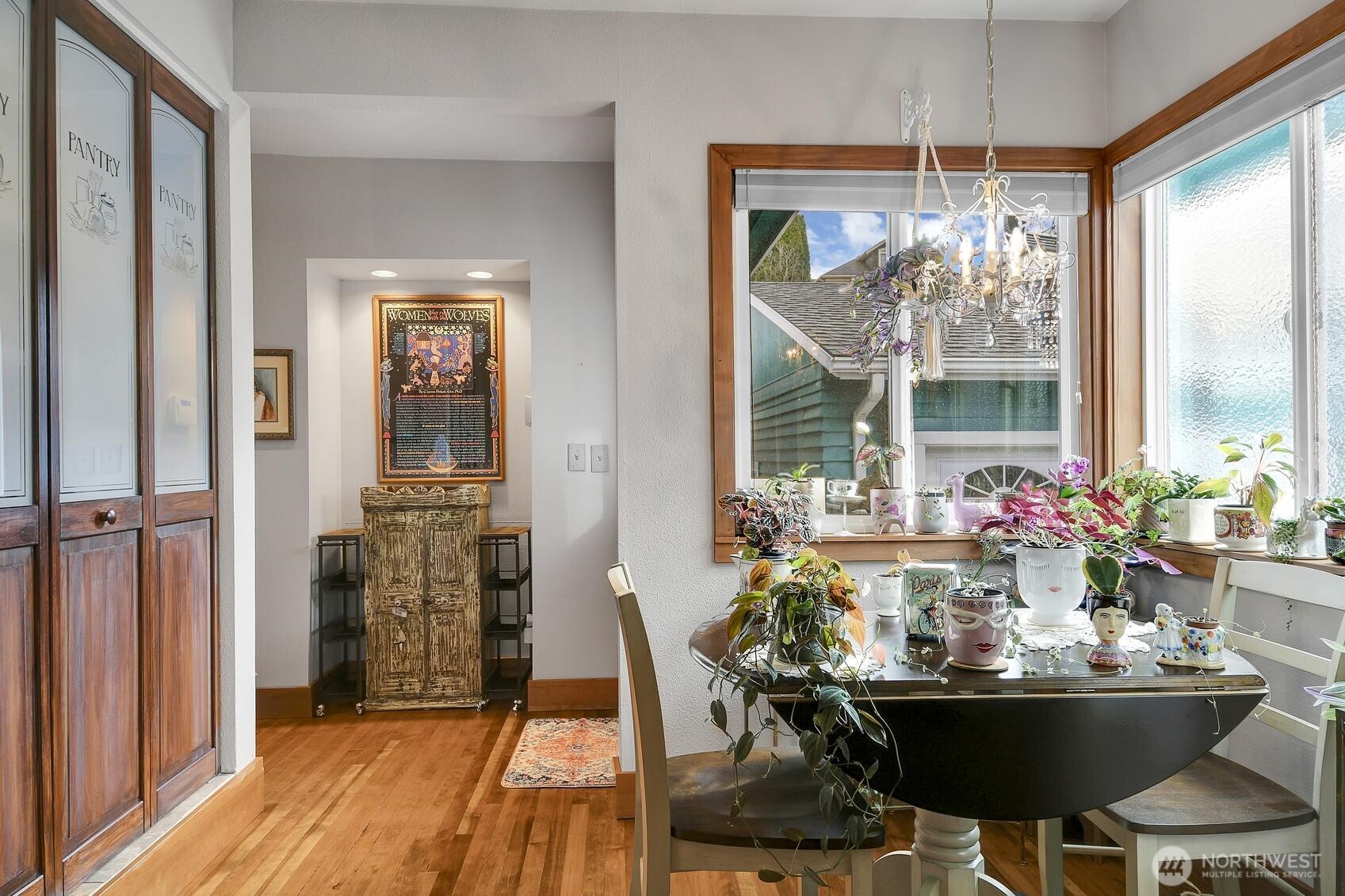 810 33rd Street Everett, WA 98201 - Photo 11 of 39 a dining room with furniture a chandelier and wooden floor