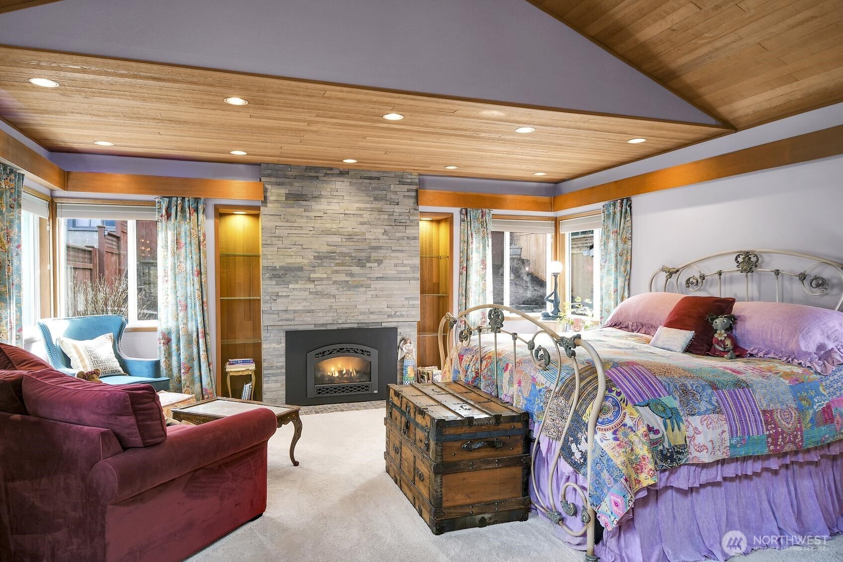 810 33rd Street Everett, WA 98201 - Photo 12 of 39 a bedroom with furniture and a fireplace