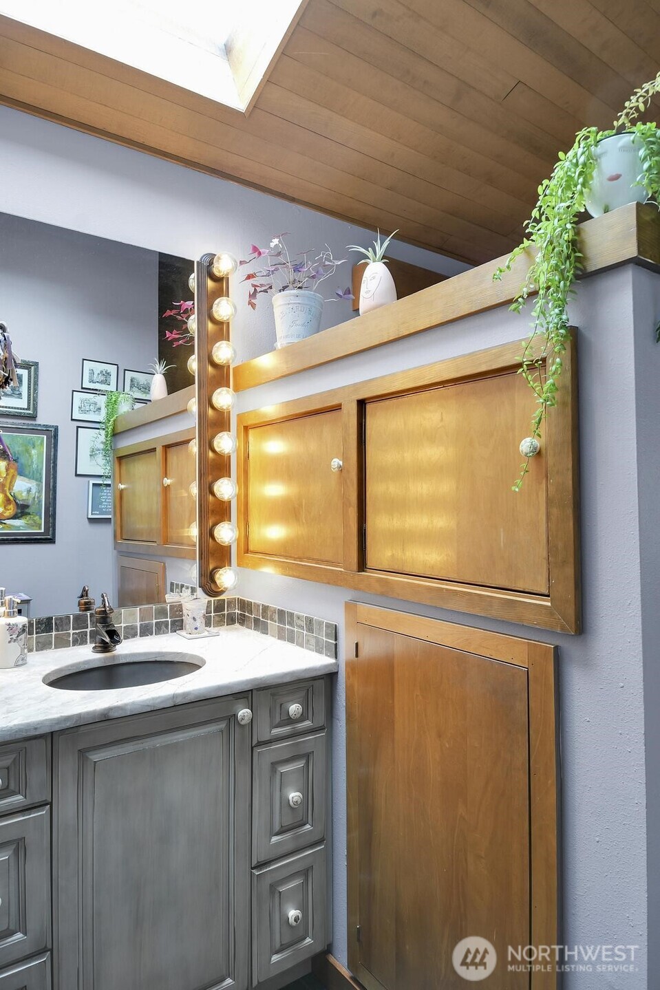 810 33rd Street Everett, WA 98201 - Photo 17 of 39 a bathroom with a sink and a mirror
