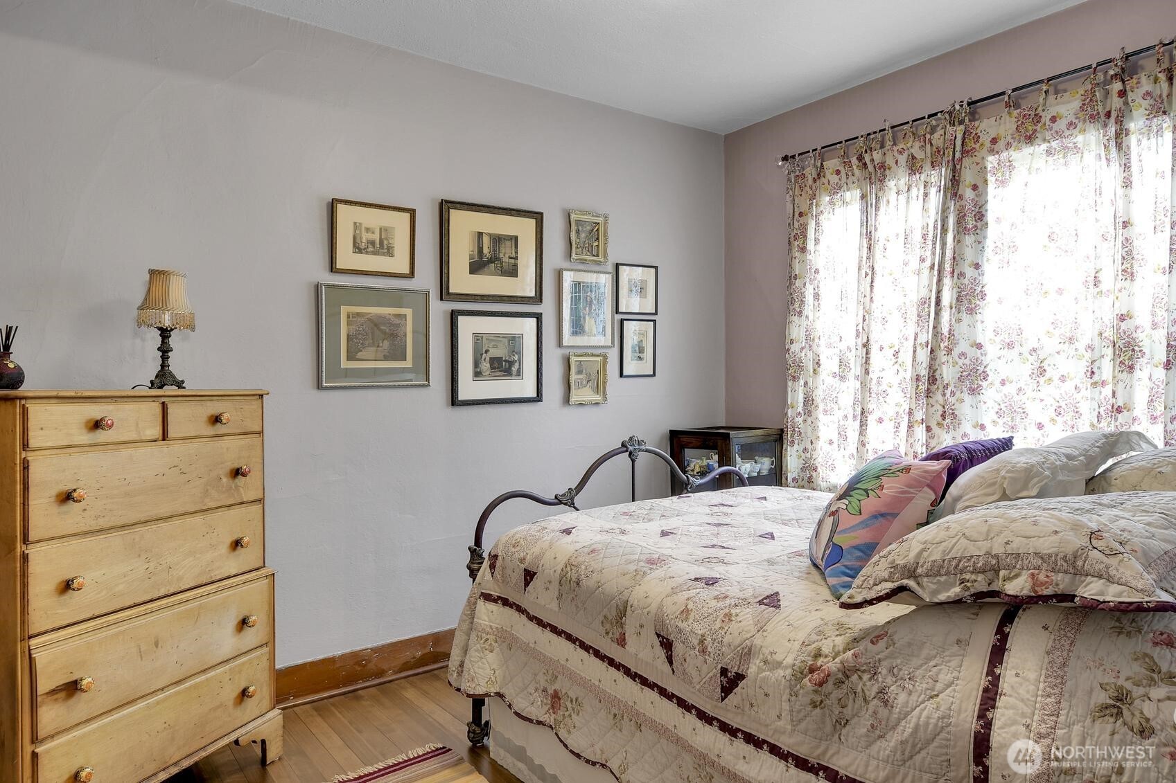 810 33rd Street Everett, WA 98201 - Photo 19 of 39 a bedroom with a bed and a dresser
