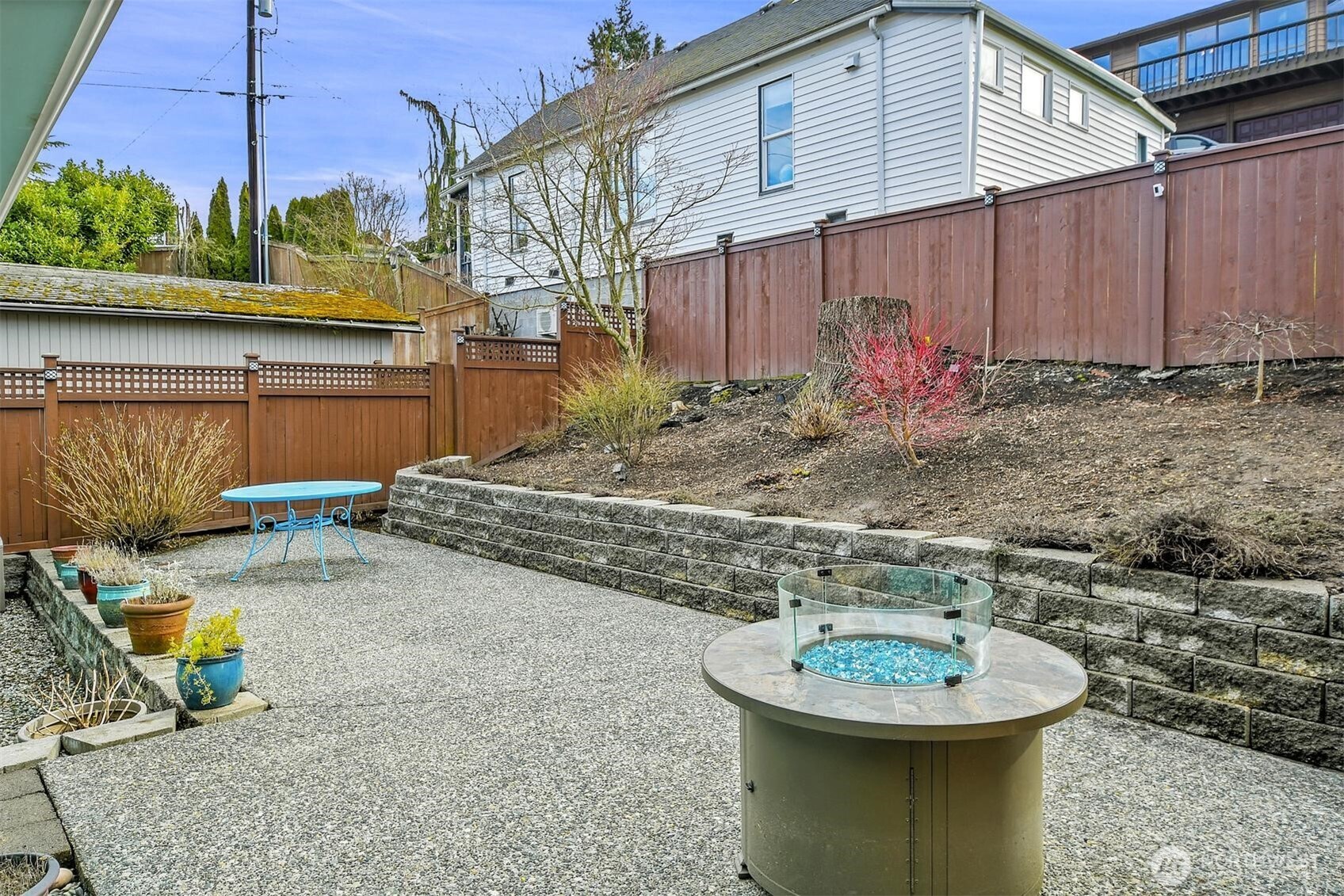 810 33rd Street Everett, WA 98201 - Photo 30 of 39 a view of a backyard with plants and a table