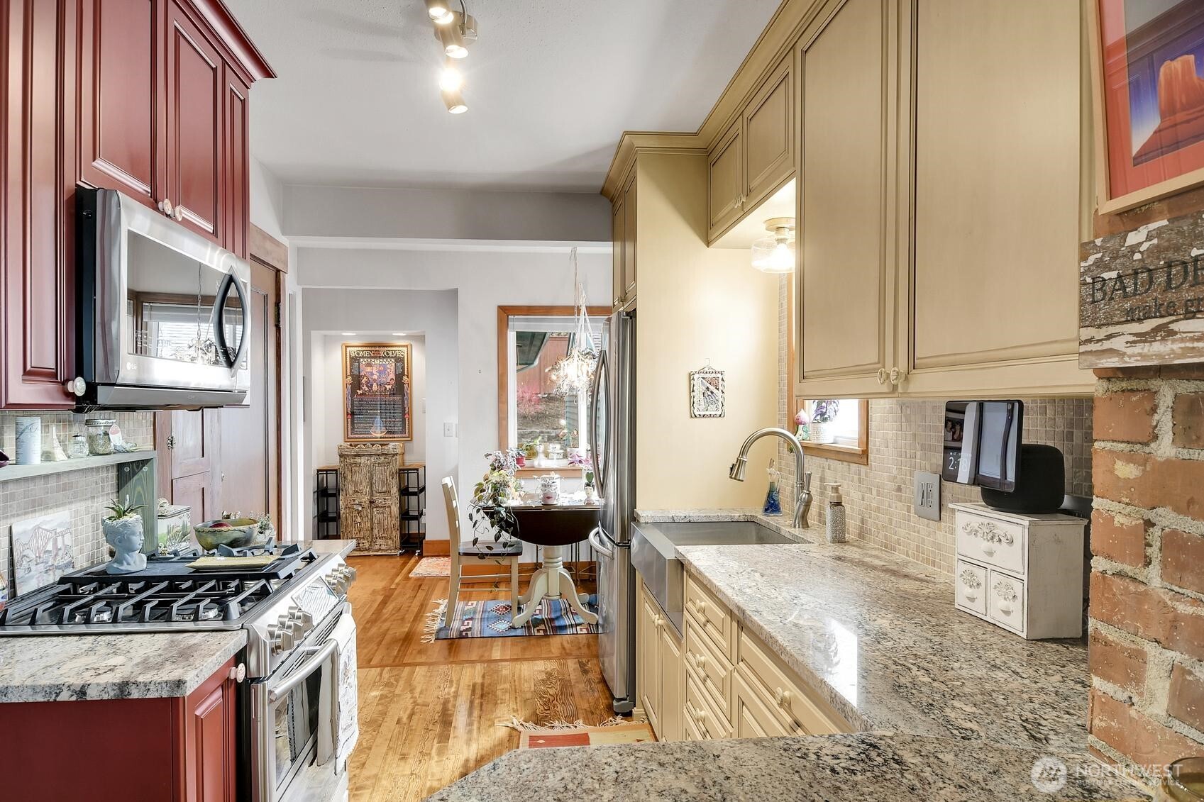 810 33rd Street Everett, WA 98201 - Photo 8 of 39 a kitchen with stainless steel appliances granite countertop a sink stove and cabinets