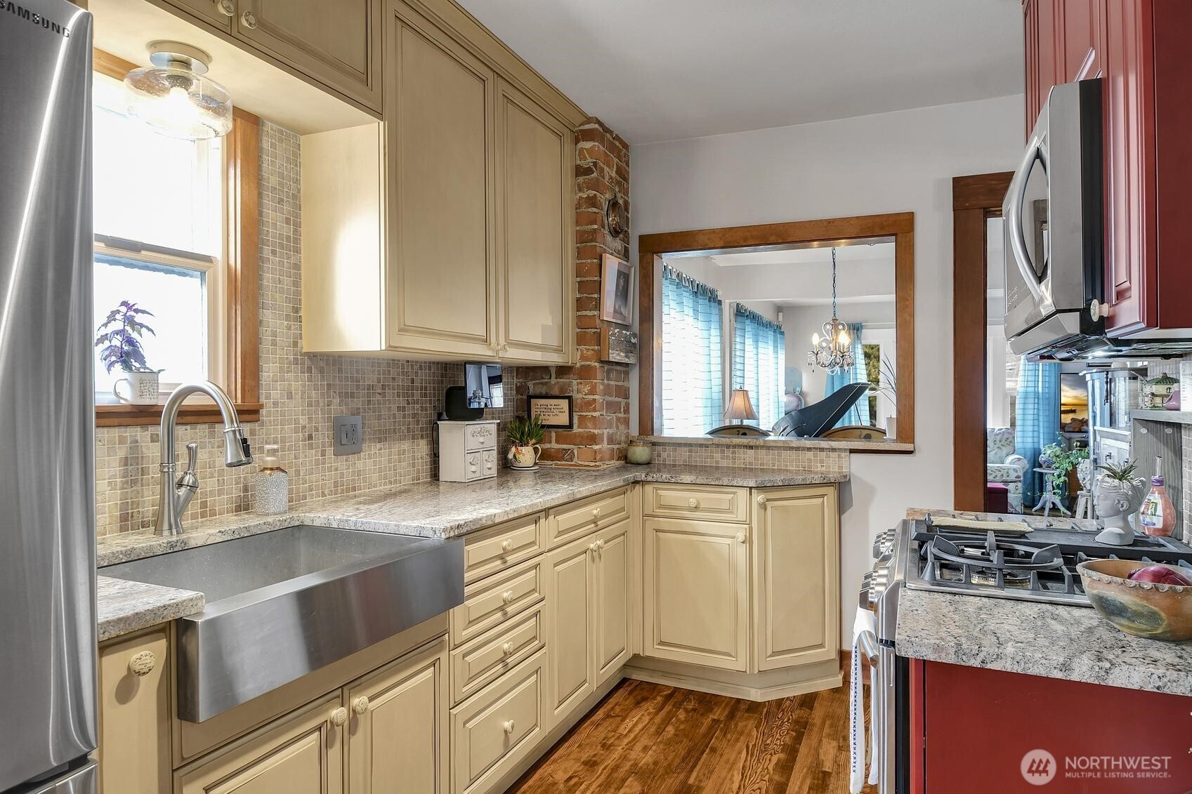 810 33rd Street Everett, WA 98201 - Photo 9 of 39 a kitchen with a sink stove and cabinets