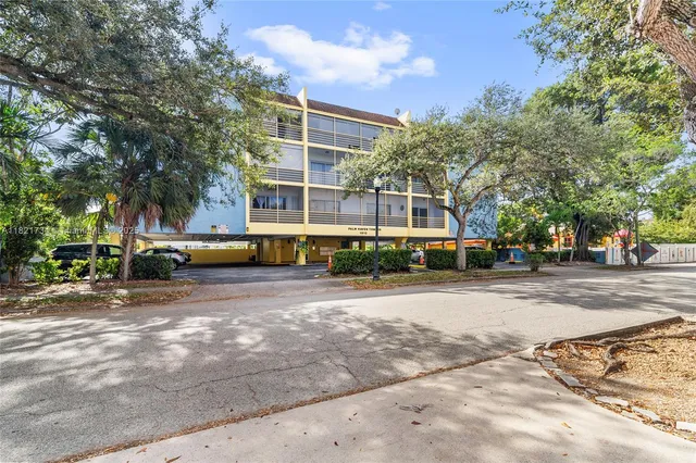 a view of a building with a street