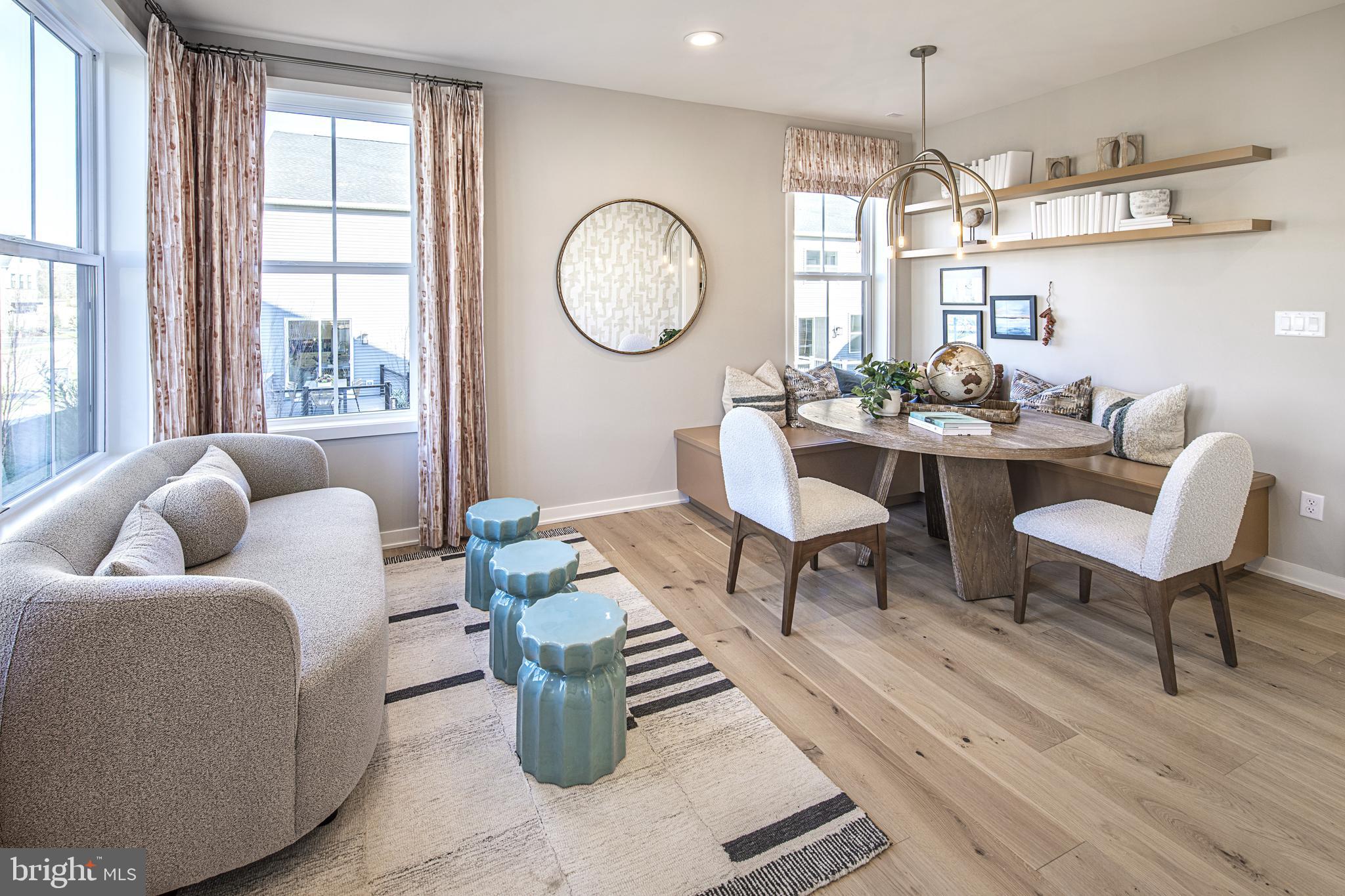 80 Alroy, Unit HOMESITE 159 Malvern, PA 19355 - Photo 6 of 15 a living room with furniture a window and a chandelier