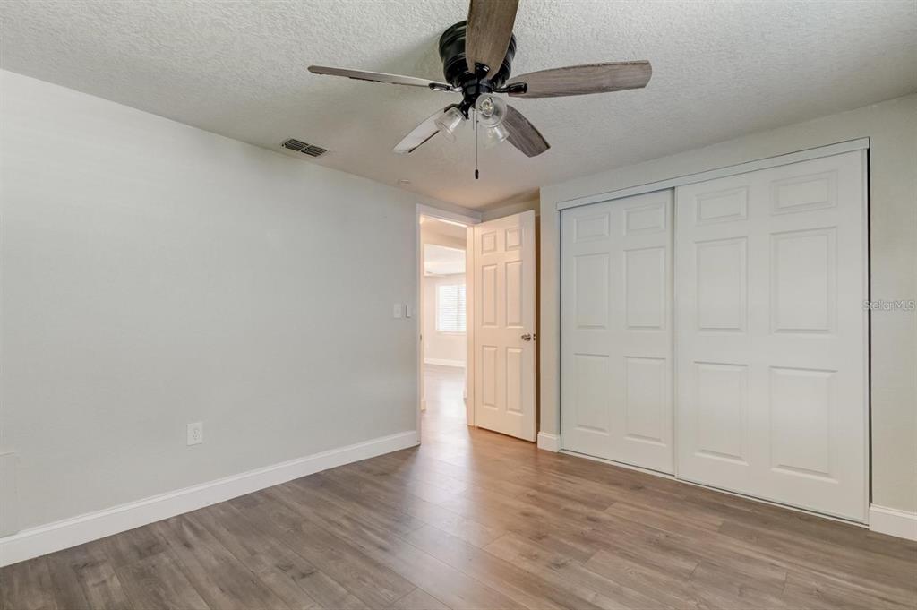 7144 Fairfax Drive Port Richey, FL 34668 - Photo 37 of 53 a view of an empty room with a window