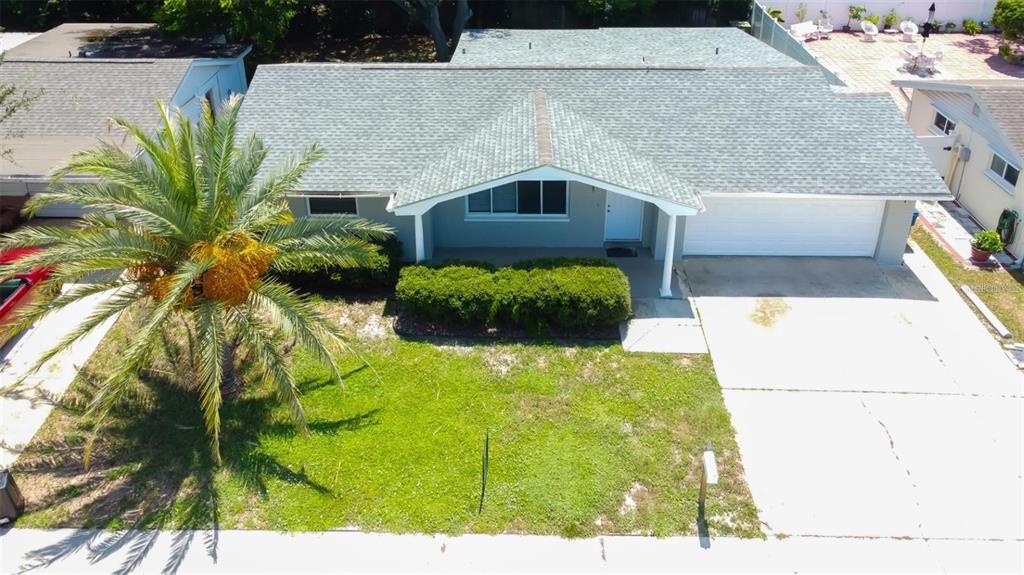 7144 Fairfax Drive Port Richey, FL 34668 - Photo 48 of 53 a aerial view of a house with a yard