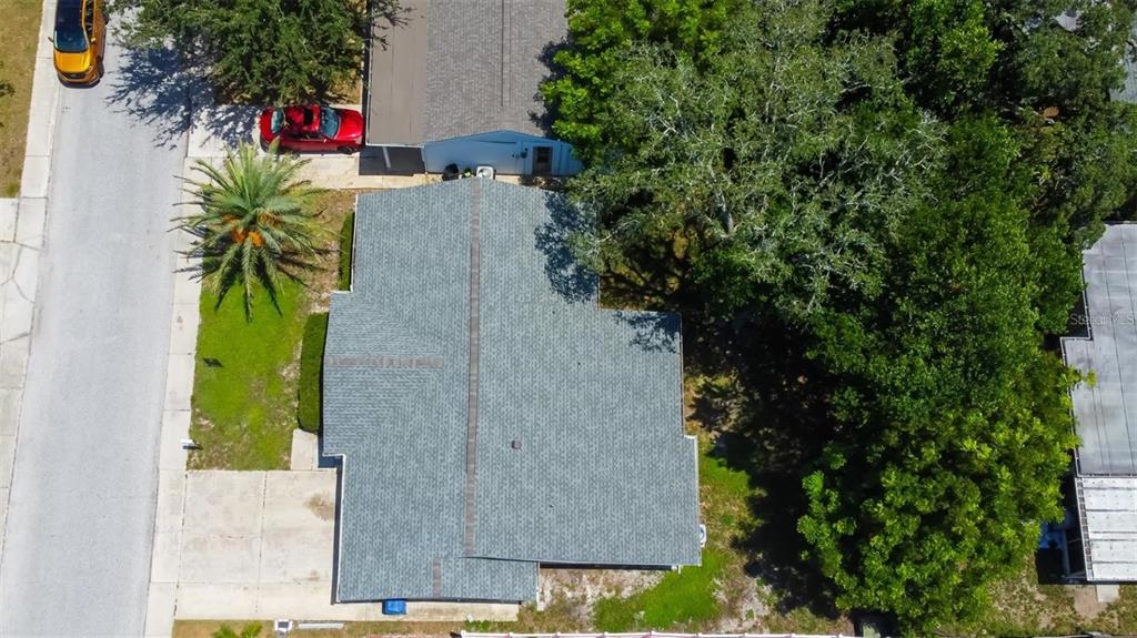 7144 Fairfax Drive Port Richey, FL 34668 - Photo 49 of 53 an aerial view of a house with a yard and garden