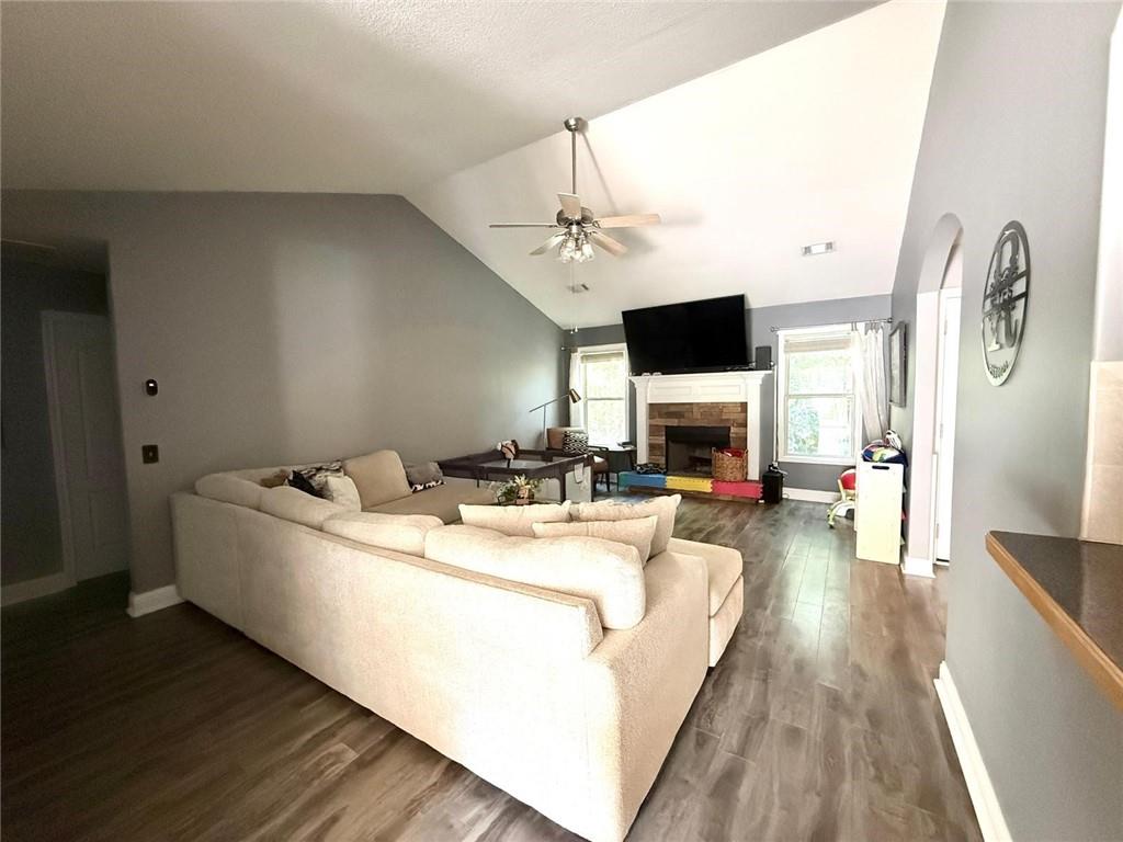 1071 Covenant Court Bethlehem, GA 30620 - Photo 11 of 20 a living room with furniture fireplace and flat screen tv