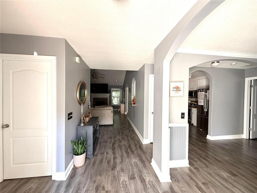 1071 Covenant Court Bethlehem, GA 30620 - Photo 8 of 20 a view of a living room with wooden floor