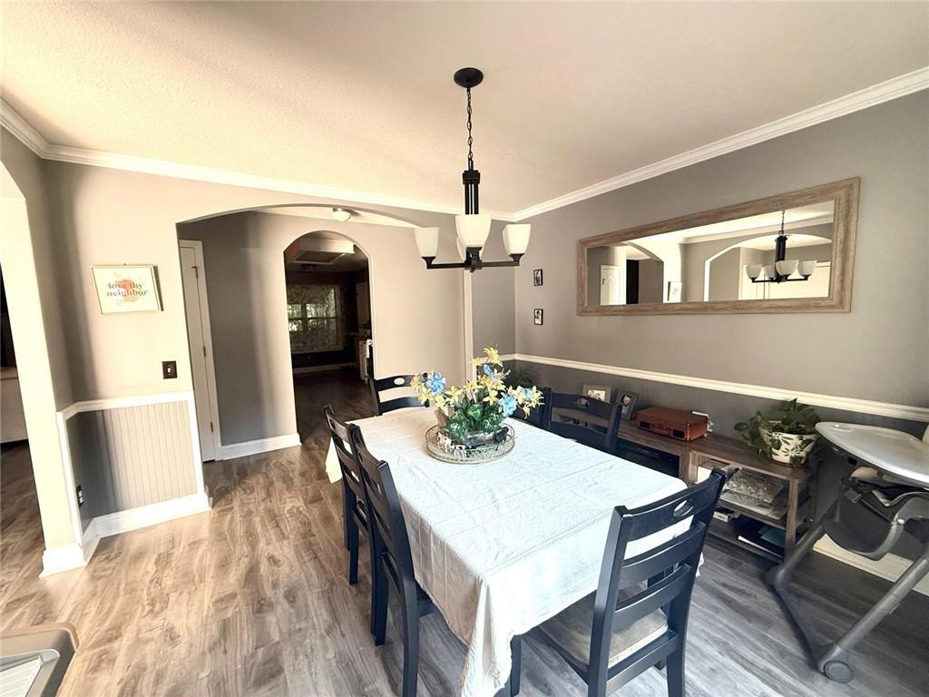 1071 Covenant Court Bethlehem, GA 30620 - Photo 10 of 20 a view of a dining room with furniture and wooden floor