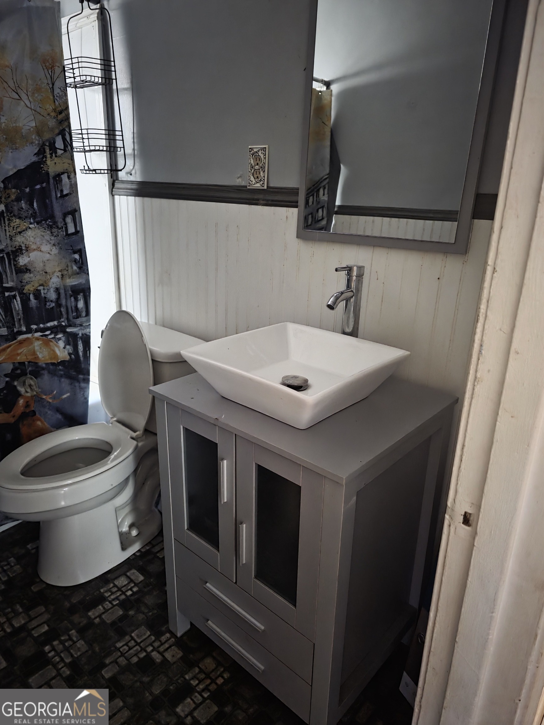 419 Chamlee Drive Fort Valley, GA 31030 - Photo 9 of 10 a bathroom with a sink toilet and mirror