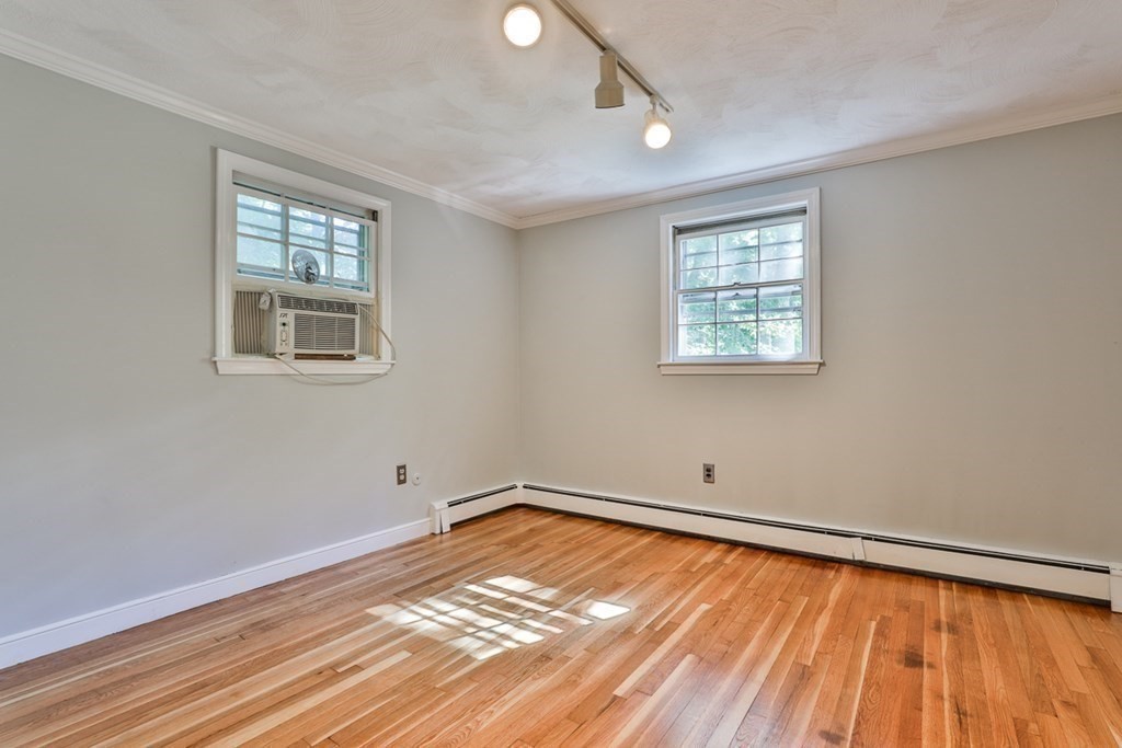 22 Withington Lane Harvard, MA 01451 - Photo 13 of 29 a view of empty room with wooden floor and fan