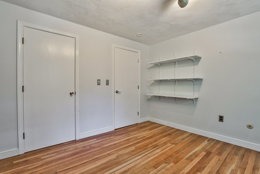 22 Withington Lane Harvard, MA 01451 - Photo 19 of 29 a view of empty room with wooden floor