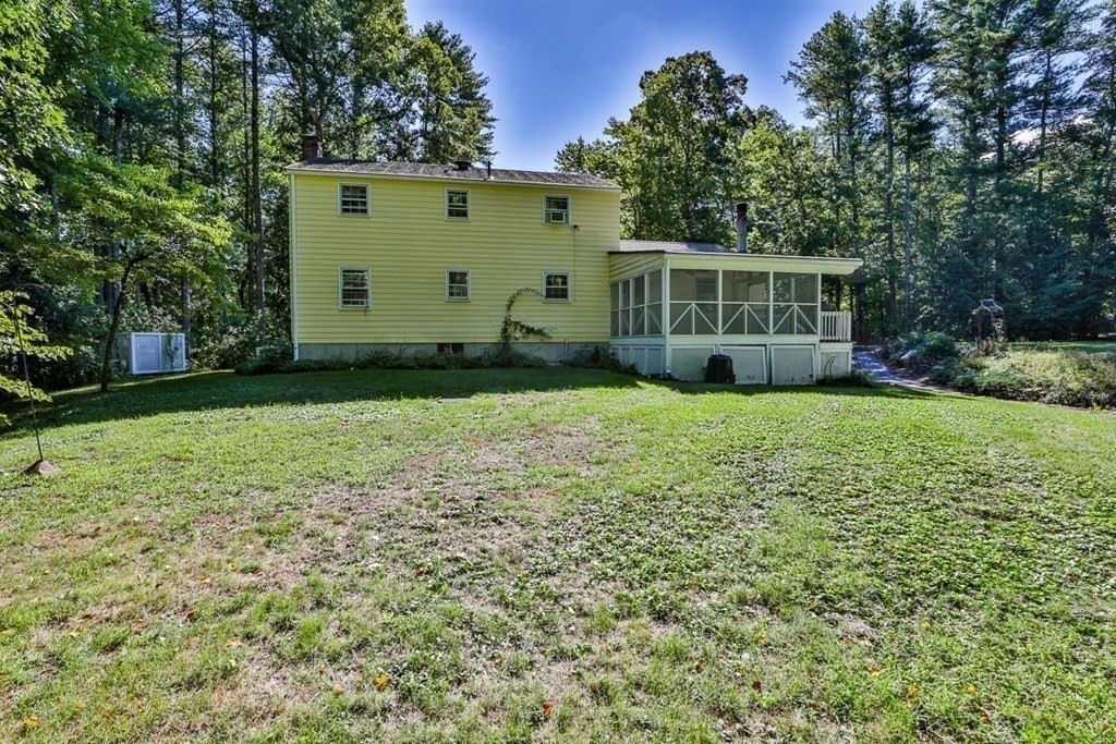 22 Withington Lane Harvard, MA 01451 - Photo 27 of 29 a view of a house with backyard and garden