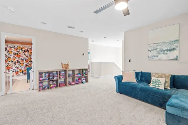 a living room with furniture and a couch