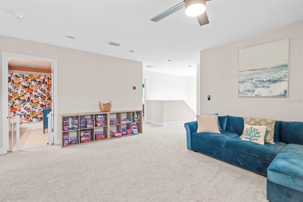 14661 Horse Trot Road Lithia, FL 33547 - Photo 20 of 46 a living room with furniture and a couch