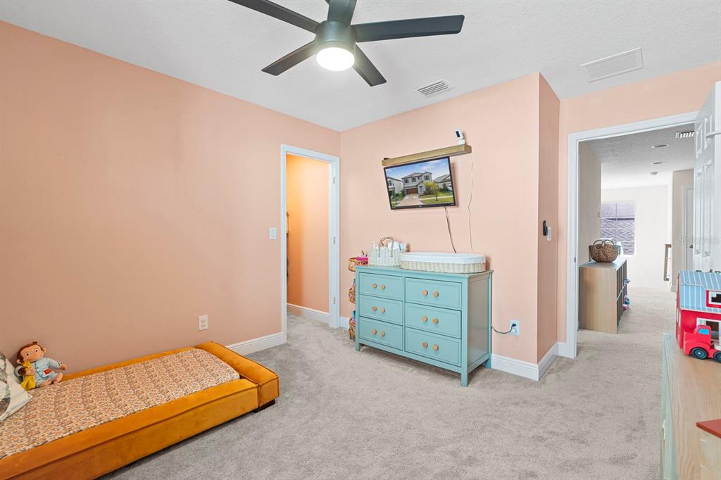 14661 Horse Trot Road Lithia, FL 33547 - Photo 27 of 46 a room with toys and dresser
