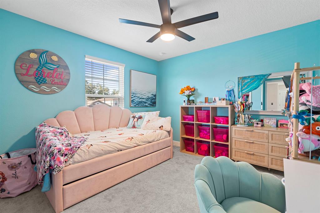 14661 Horse Trot Road Lithia, FL 33547 - Photo 30 of 46 a bedroom with a bed and a window