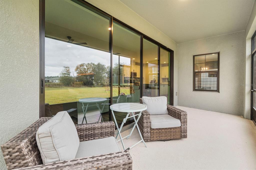 14661 Horse Trot Road Lithia, FL 33547 - Photo 34 of 46 a living room with furniture and a large window