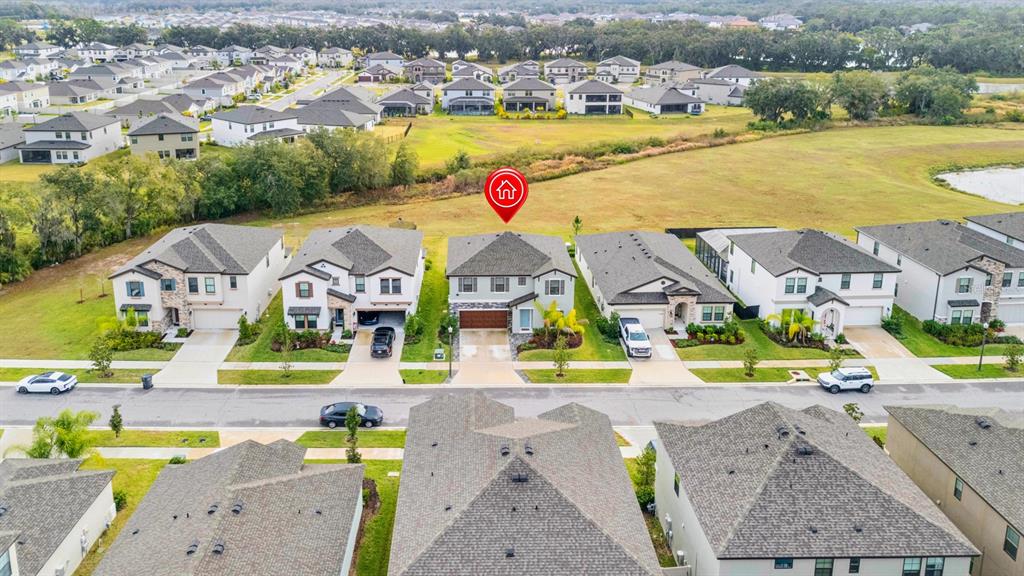 14661 Horse Trot Road Lithia, FL 33547 - Photo 37 of 46 an aerial view of a house with a swimming pool