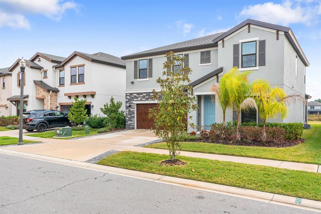 14661 Horse Trot Road Lithia, FL 33547 - Photo 41 of 46 a front view of a house with garden
