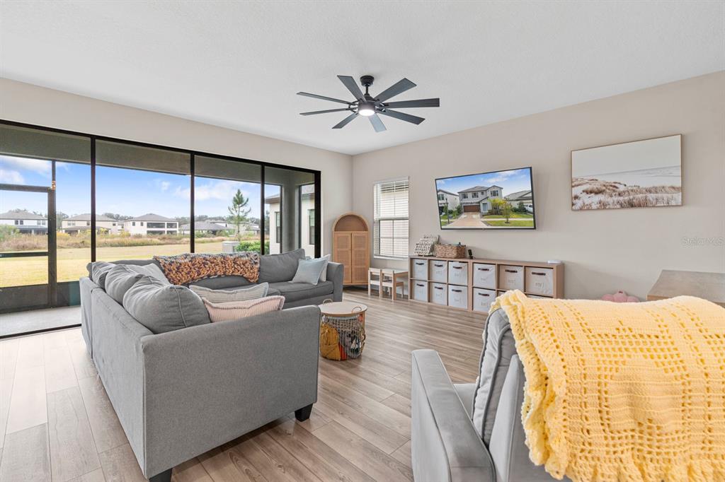 14661 Horse Trot Road Lithia, FL 33547 - Photo 6 of 46 a living room with furniture and a large window