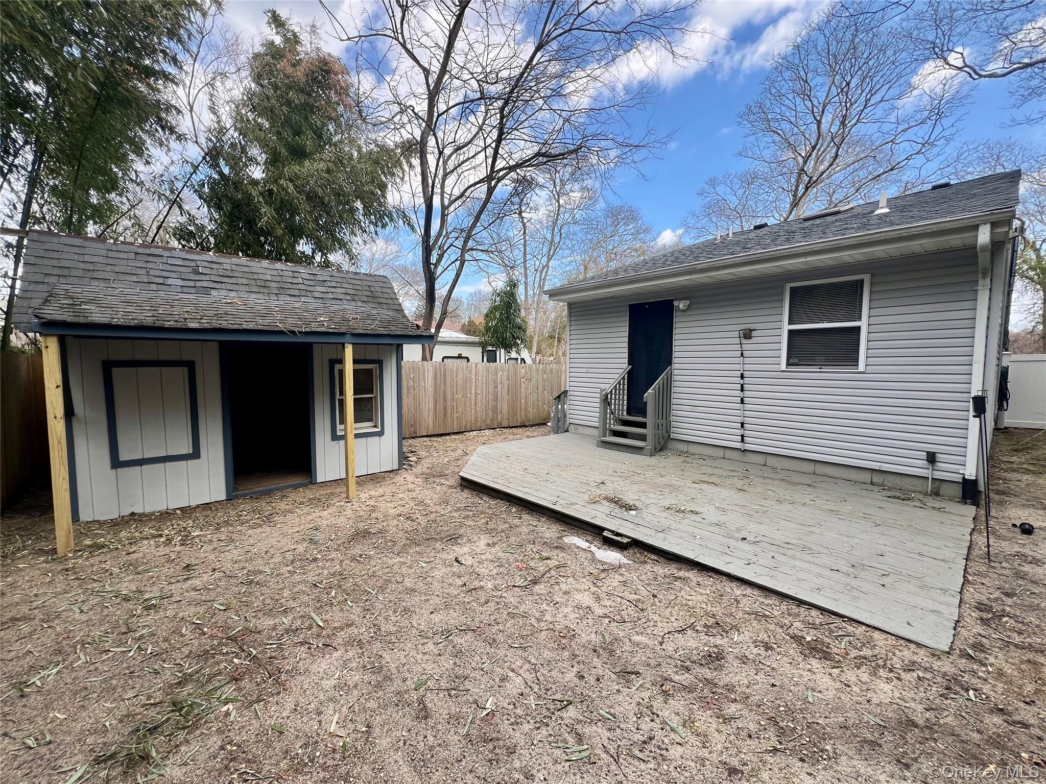 10 Rutland Road Mastic, NY 11950 - Photo 12 of 12 a house view with a outdoor space