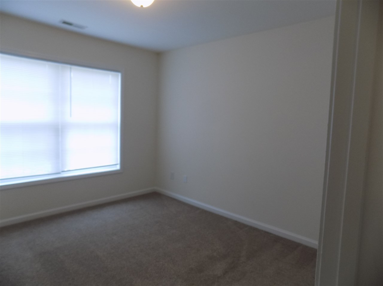 1209 Kinsfolk Circle Raleigh, NC 27610 - Photo 7 of 11 Guest Bedroom