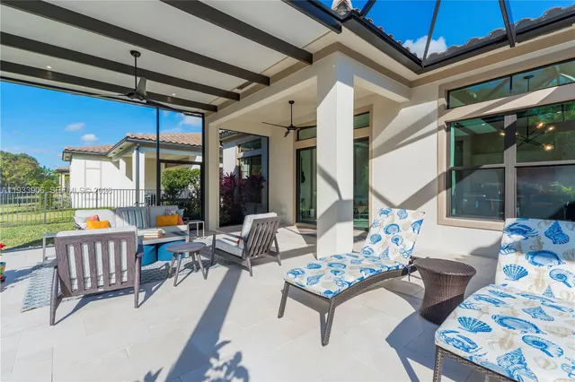 a outdoor space with patio the couches and a dining table with the garden view