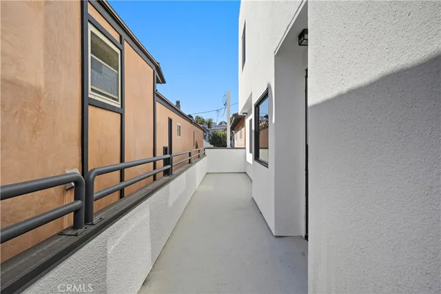 a kitchen with stainless steel appliances a sink and a refrigerator