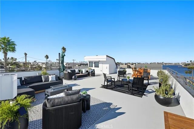 a view of roof deck with seating space