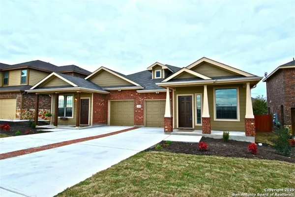 a front view of a house with a porch