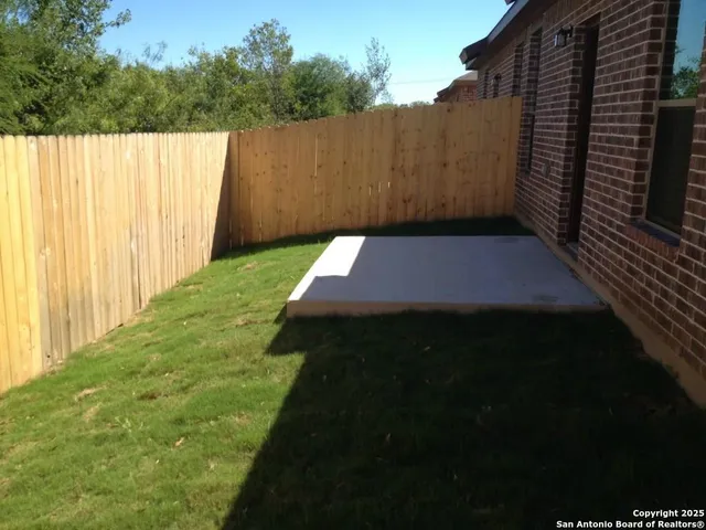 a view of outdoor space and yard