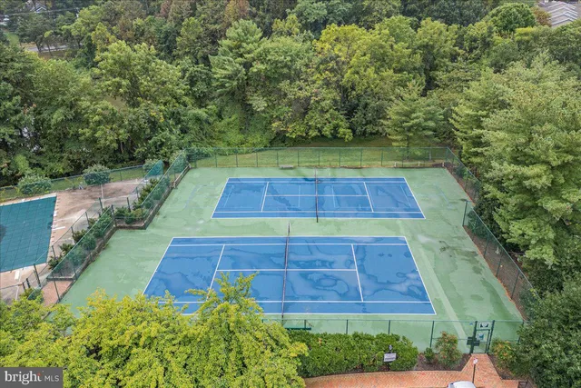 a picture of a bench in a white wall