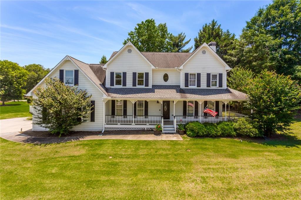 34 Morris Road Hiram, GA 30141 - Photo 1 of 1 a front view of a house with a yard