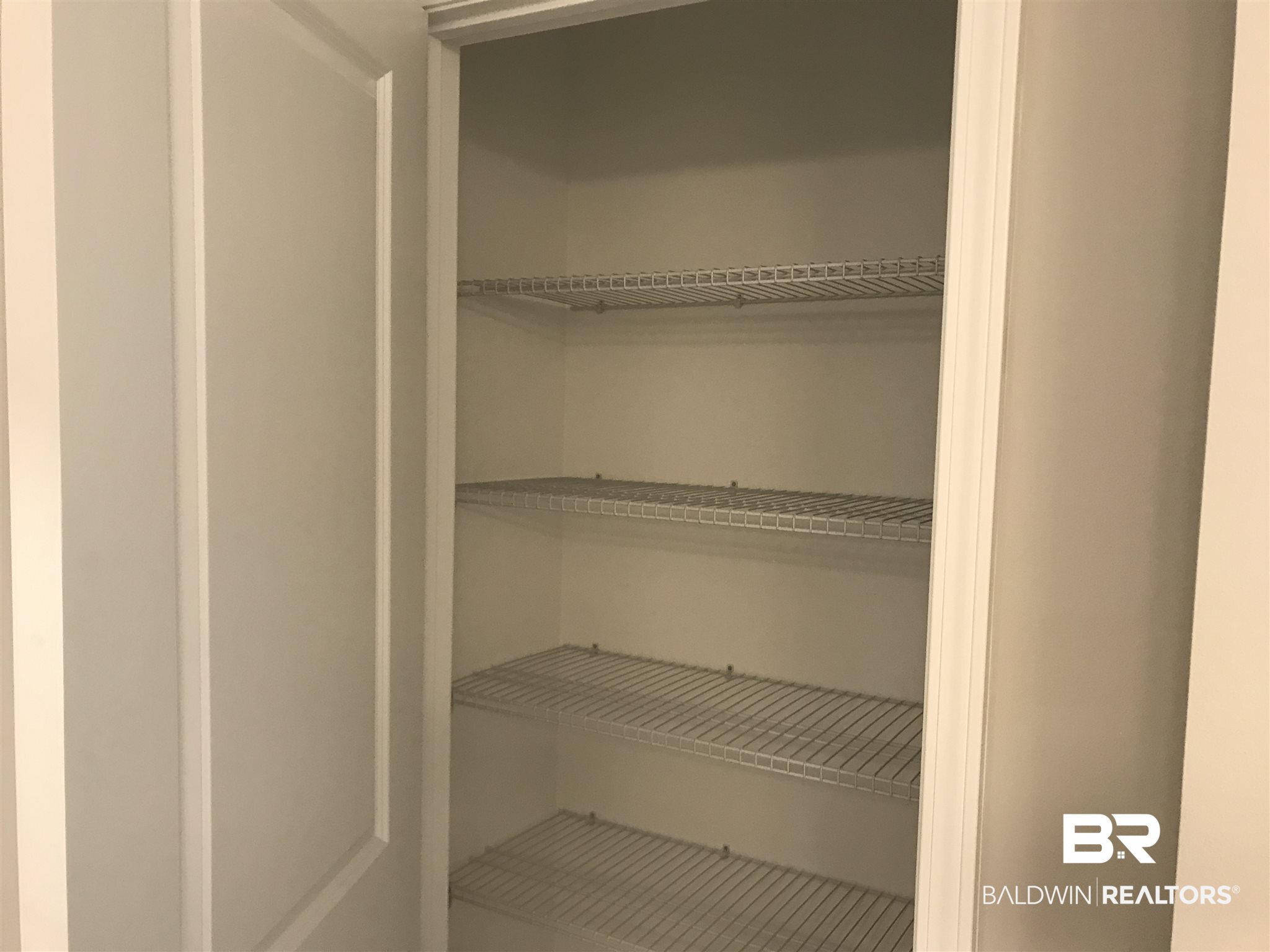 105 Sage Lane Fairhope, AL 36532 - Photo 18 of 44 Master Linen Closet