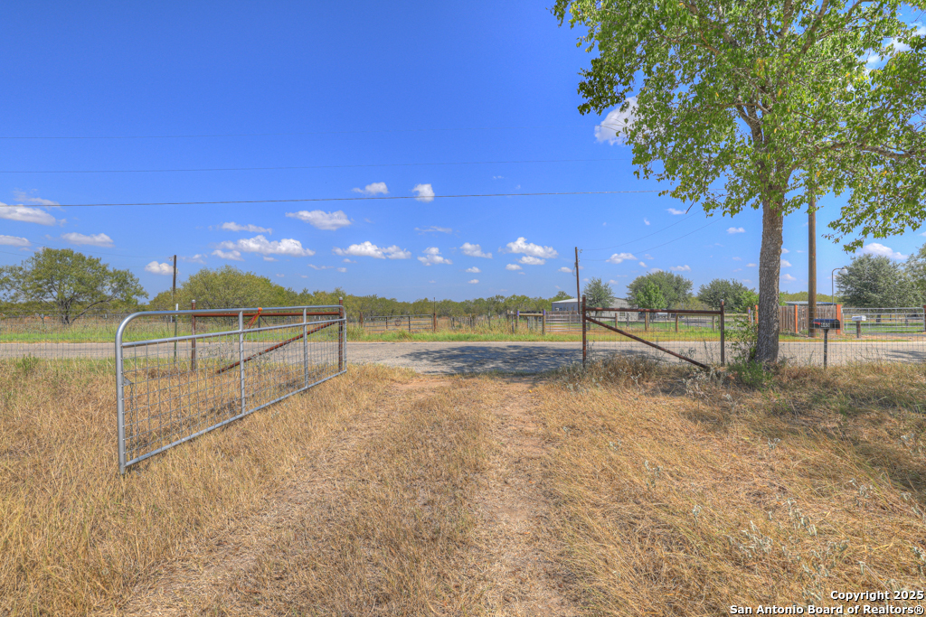 445 Single Oak Road Seguin, TX 78155 - Photo 15 of 20 a view of an outdoor space and tennis court
