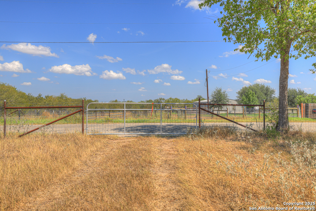 445 Single Oak Road Seguin, TX 78155 - Photo 4 of 20 a view of swimming pool with outdoor seating and yard