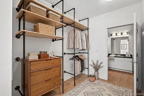 a workspace with furniture and potted plant