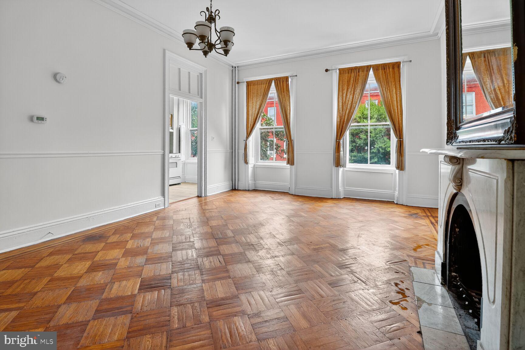 1404 Madison Avenue Baltimore, MD 21217 - Photo 21 of 54 a view of empty room with window and fireplace