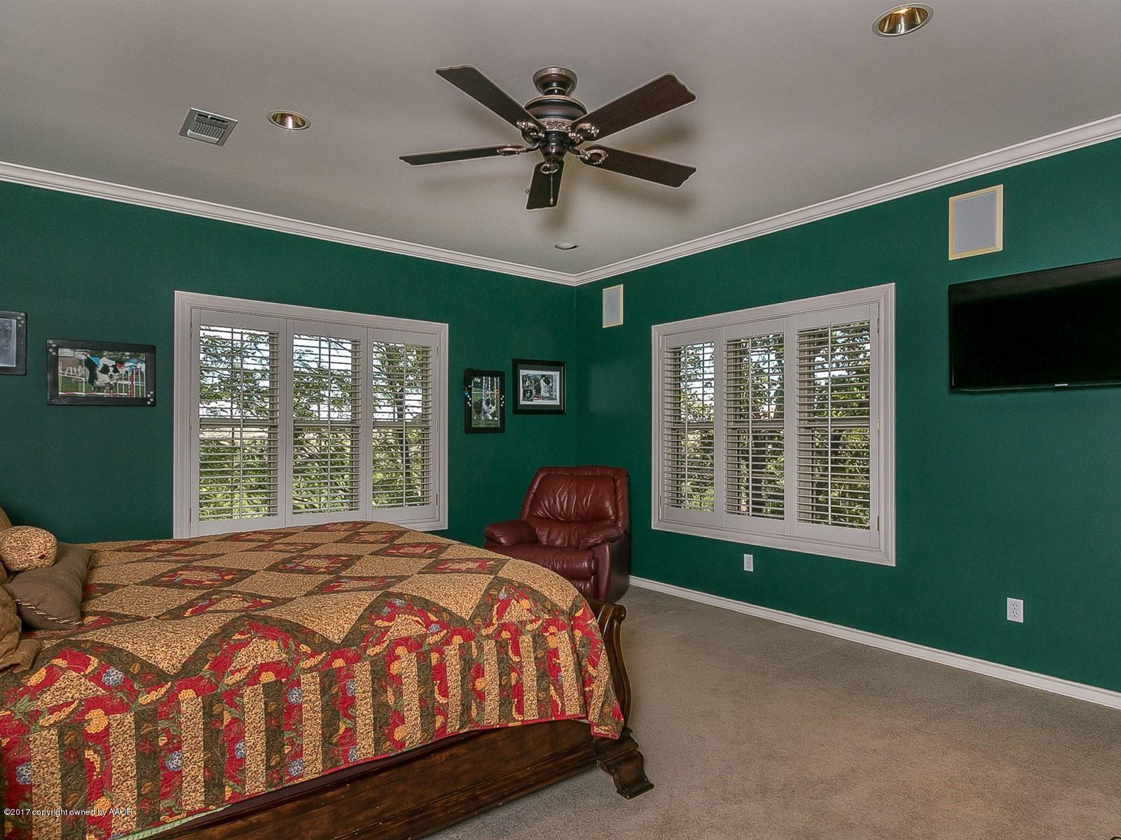 509 Fox Ridge Road Amarillo, TX 79118 - Photo 19 of 55 a bedroom with a bed and window