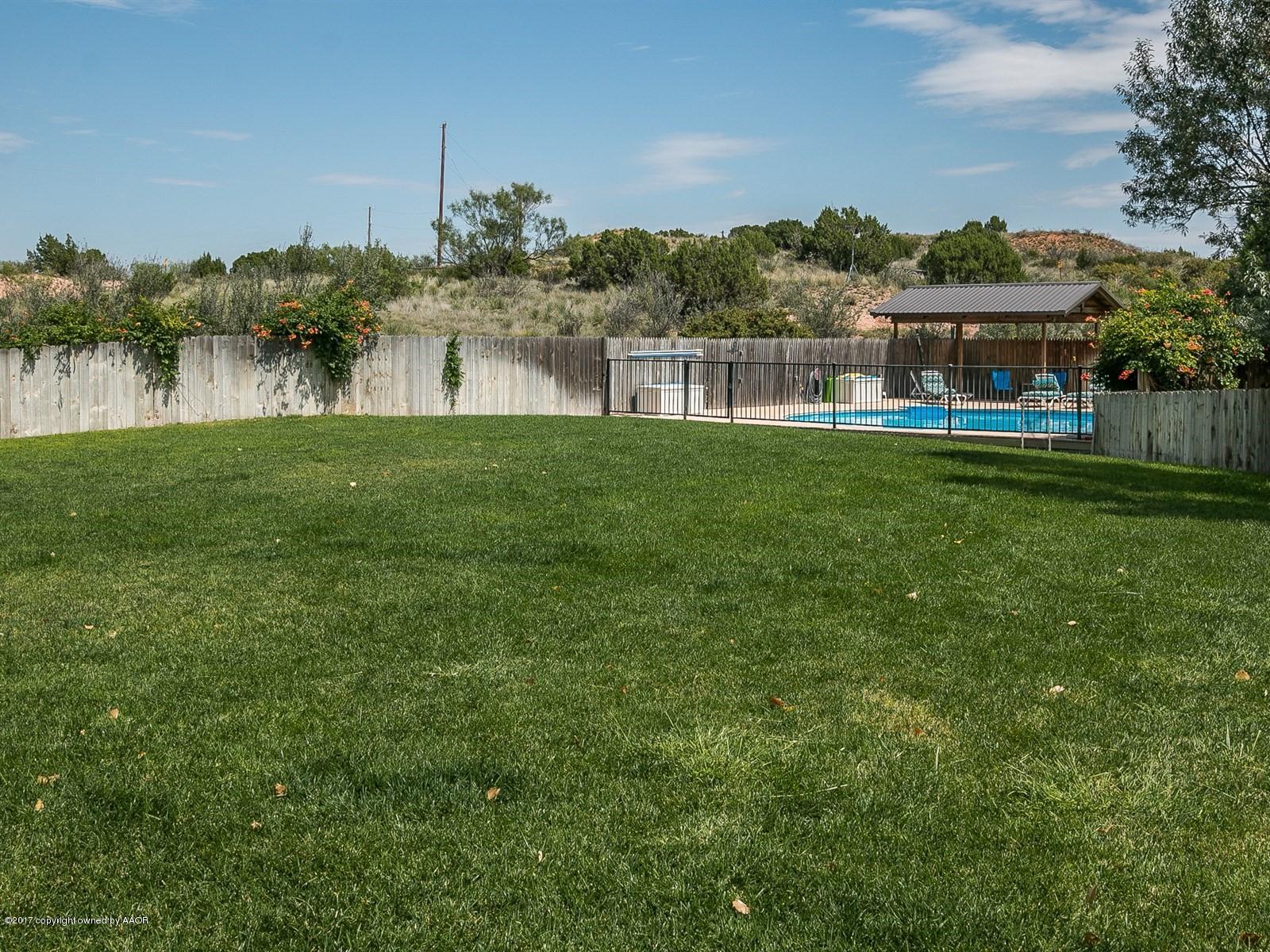 509 Fox Ridge Road Amarillo, TX 79118 - Photo 36 of 55 a view of a house with a yard