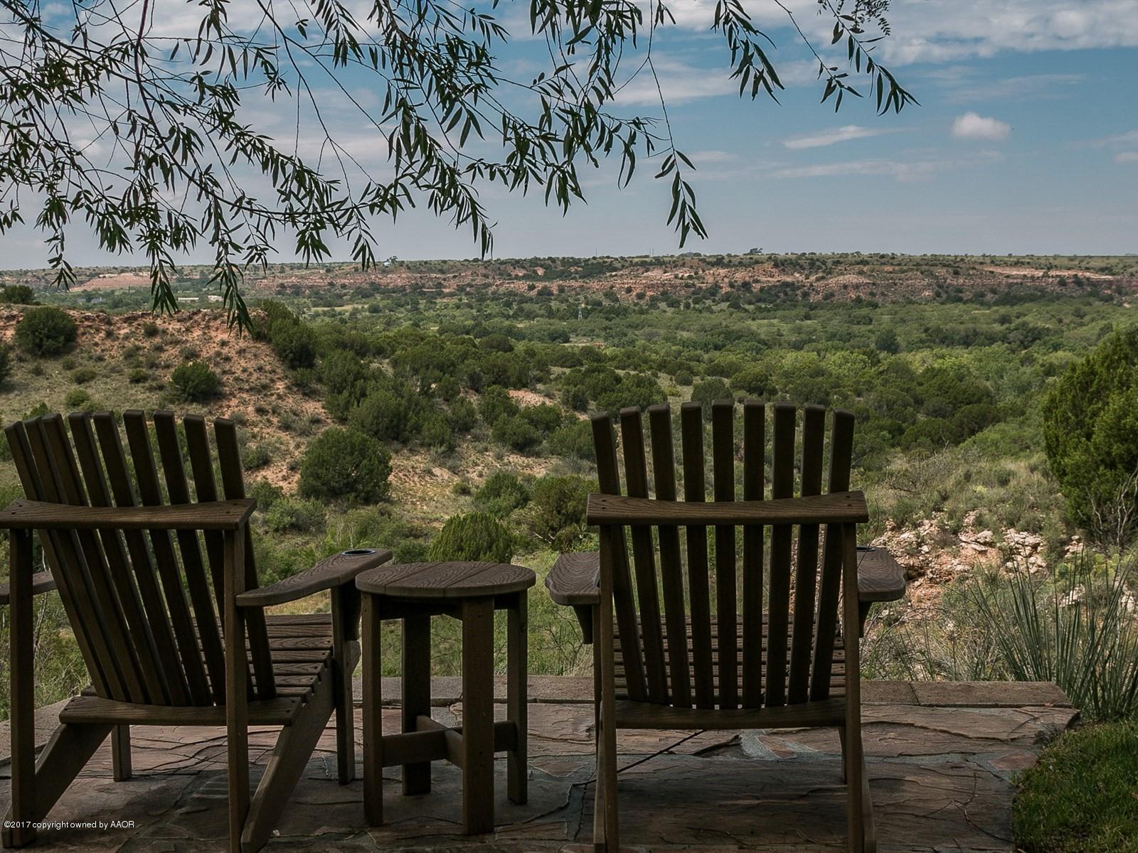 509 Fox Ridge Road Amarillo, TX 79118 - Photo 5 of 55 a view of a chairs and table in the patio