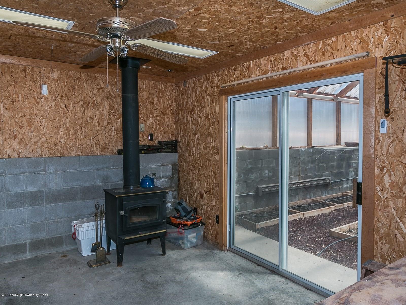 509 Fox Ridge Road Amarillo, TX 79118 - Photo 52 of 55 a front view of a house with a glass door and glass door