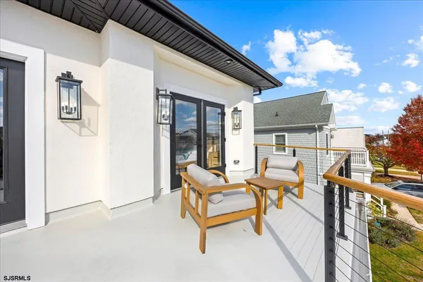 a bedroom with a bed and a night stand