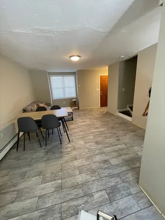 a workspace with furniture and window