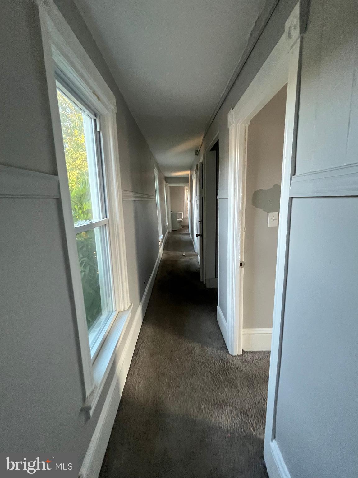 212 Rancocas Road Mount Holly, NJ 08060 - Photo 18 of 27 a view of a hallway with wooden floor and stairs